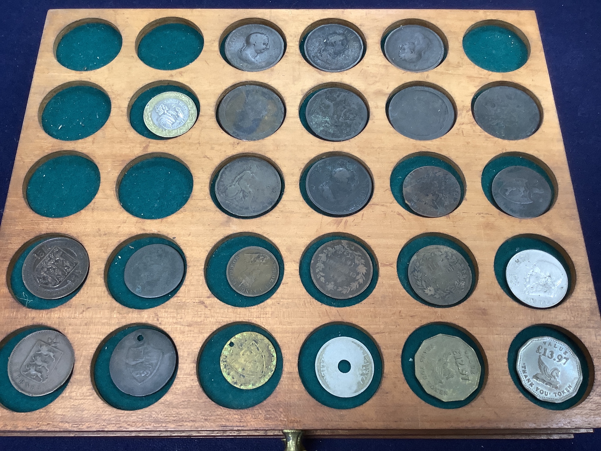 A coin collection in a coin collector's case, 30 x 26 x 17cm